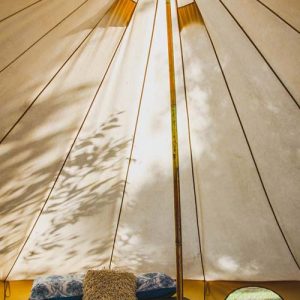 double bed inside bell tent